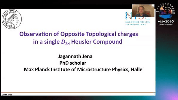 Observation of opposite topological charges in single D2d Heusler compound (B)
